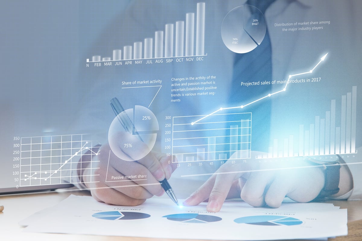 Professional analyzing financial data charts and graphs